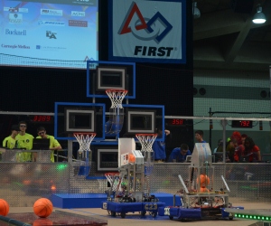 Brown (left) with First Robotics teammates